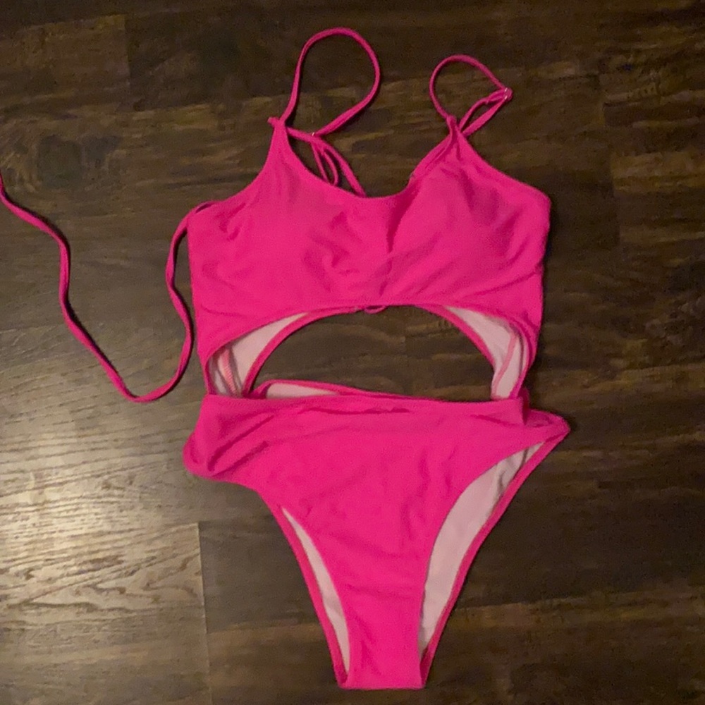 Never worn- Hot pink swim suit size Large